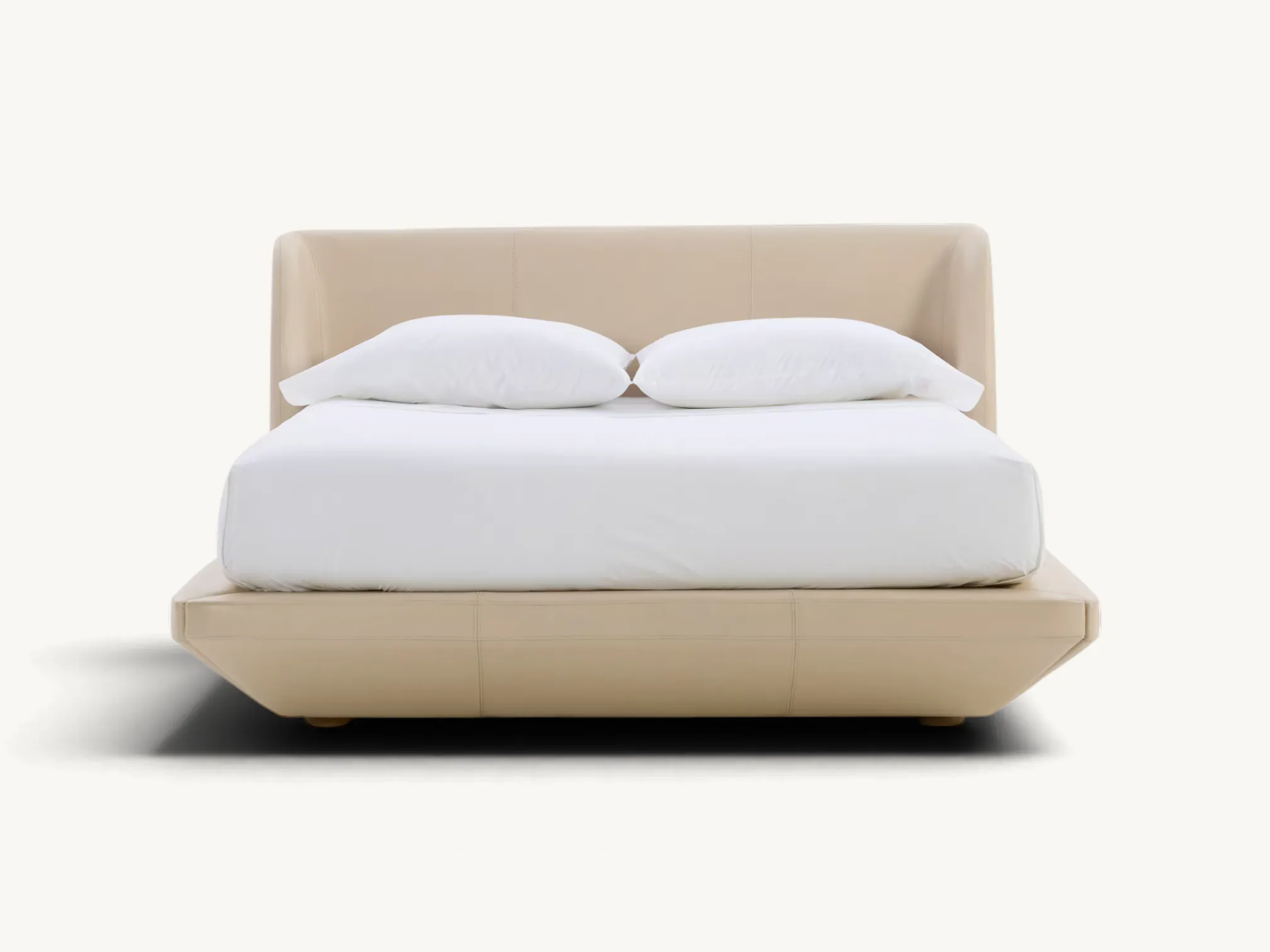 Contemporary upholstered platform bed with an inward-tapering lower frame base and a cushioned headboard with subtly forward-curving sides, shown in beige leather and cream textured fabric variations.