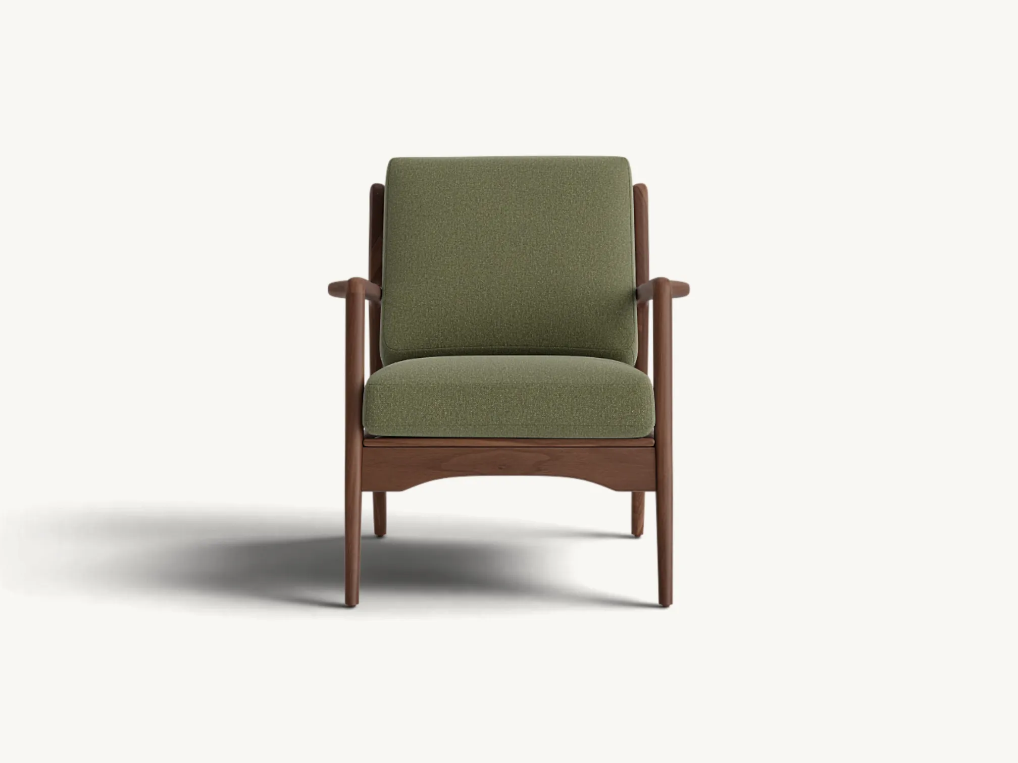 Mid-century modern teak wood armchair with olive green cushions and spindle back design.