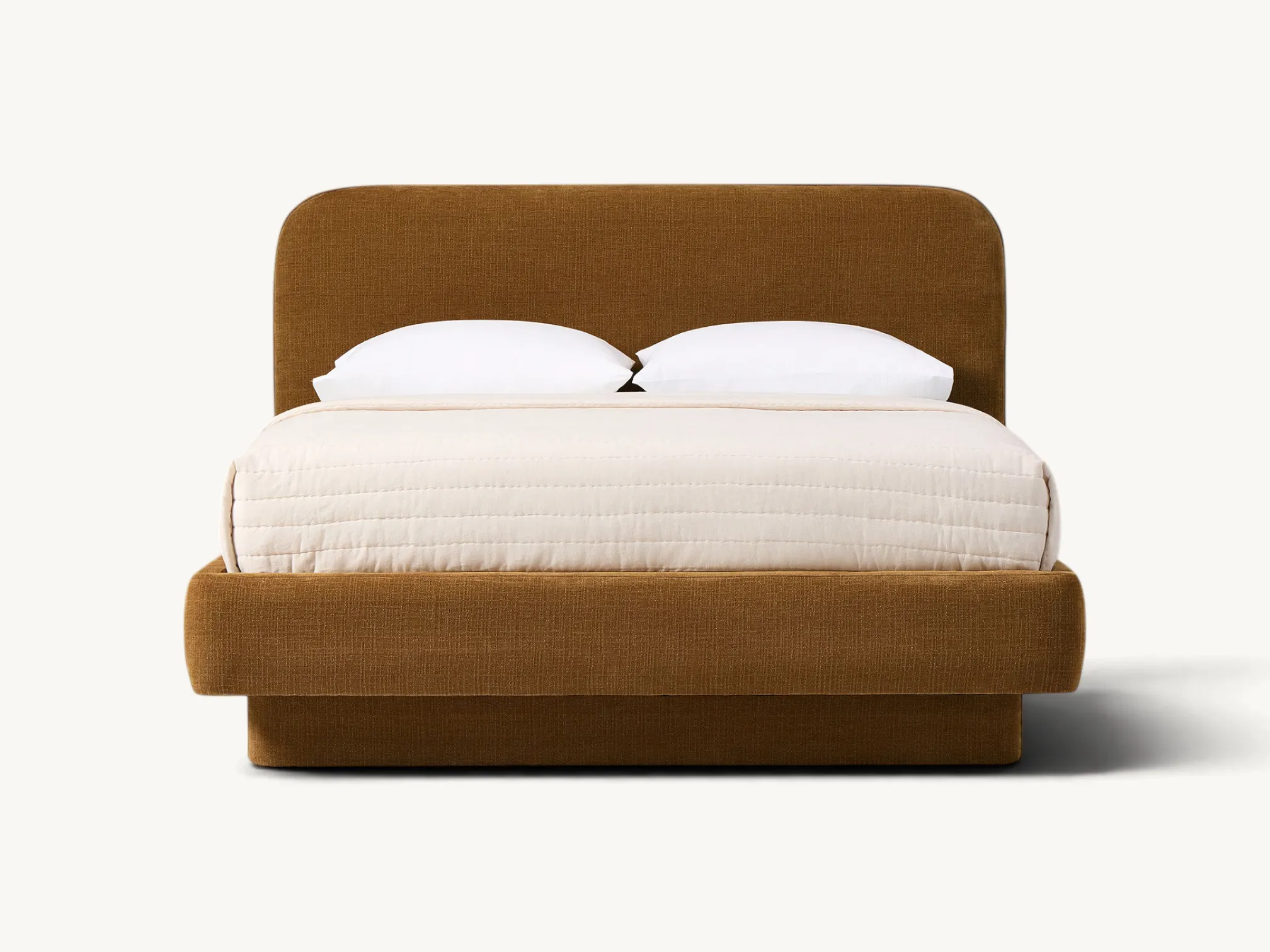Low-slung natural oak platform bed featuring a thin-frame wooden headboard with two large, removable beige fabric backrest cushions and an integrated wooden slat support base.