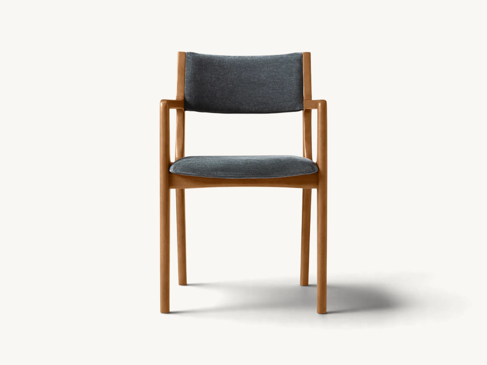 Mid-Century Modern teak wood armchair with integrated armrests and charcoal grey fabric seat.