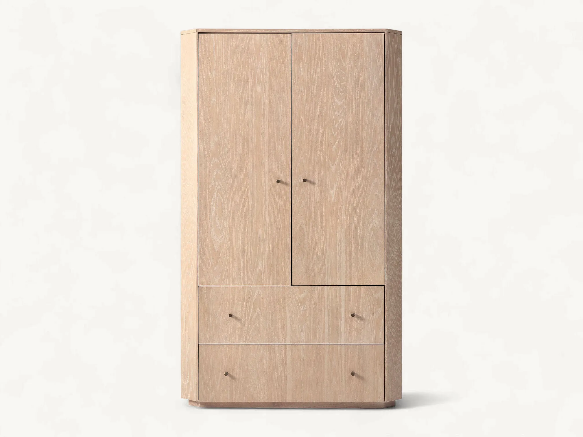 Solid teak wood armoire with a cerused finish, featuring a clean rectangular silhouette and minimalist brass pulls.