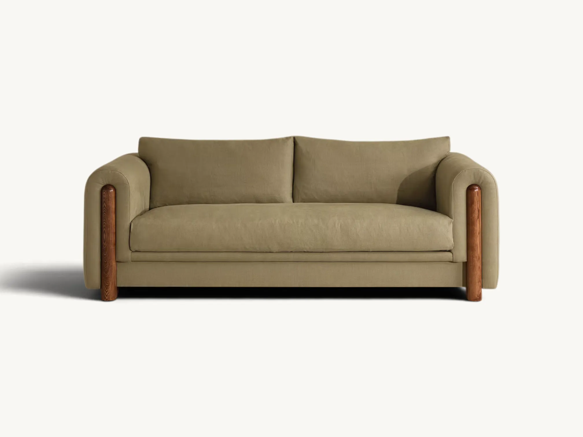Mid-Century Modern two seater sofa with olive green upholstery, exposed teak wood cylindrical arm accents, and a comfortable boxy silhouette.