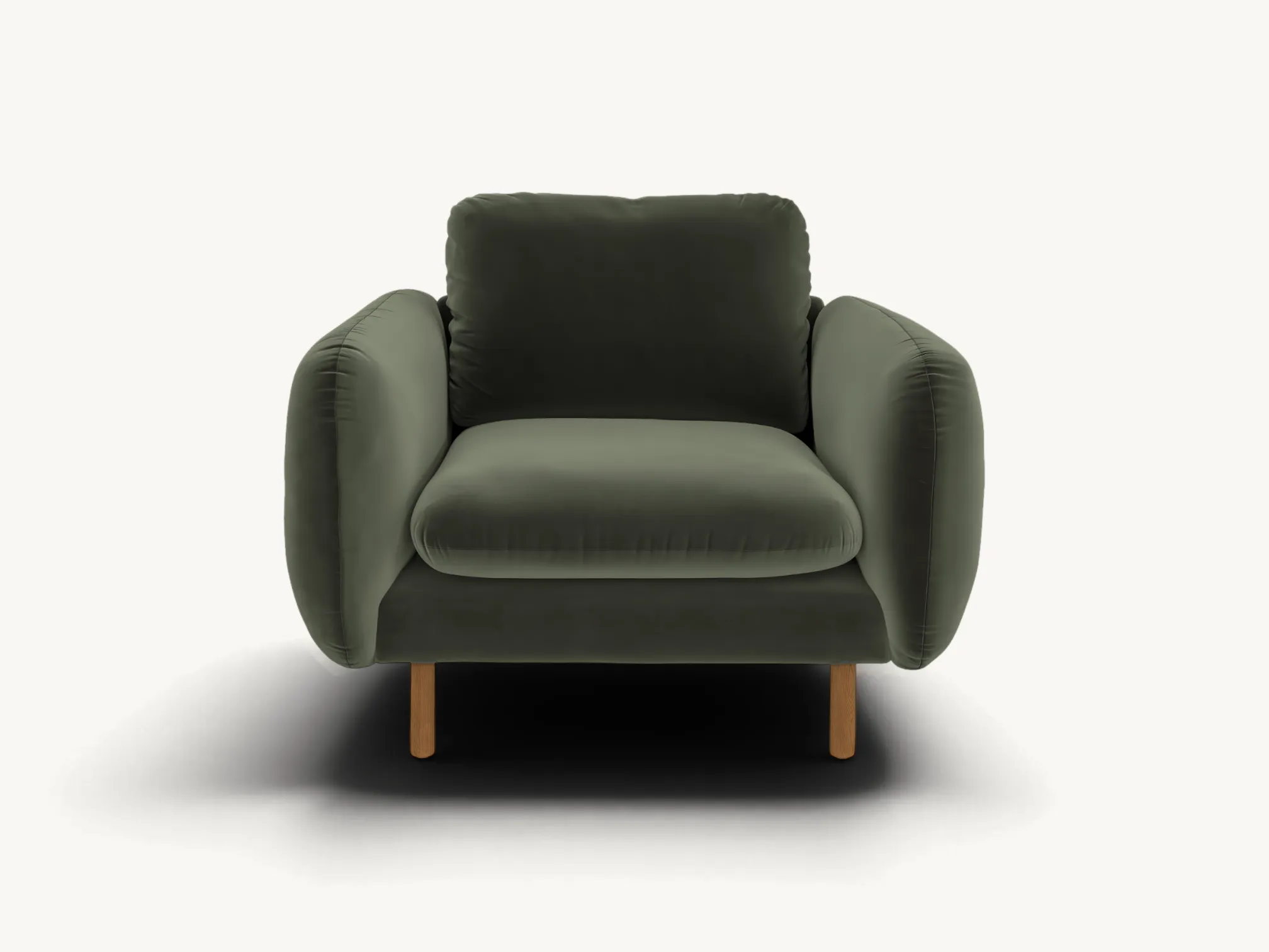 Modern forest green velvet lounge chair with tapered teak wood legs, contemporary upholstered armchair with plush cushions for living room or reading nook.