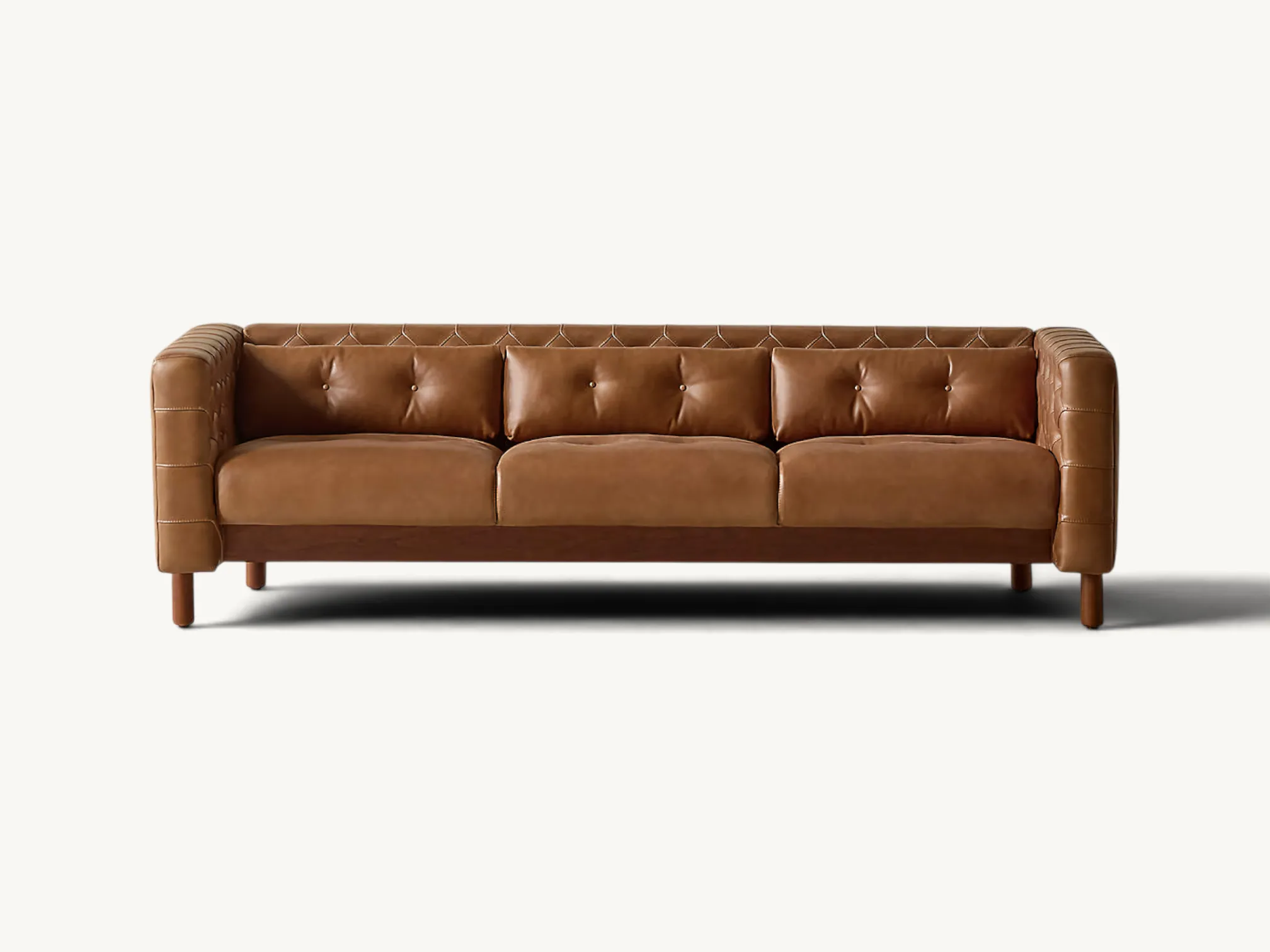 Mid-century style olive green velvet sofa with button tufting and tapered teak wood legs.