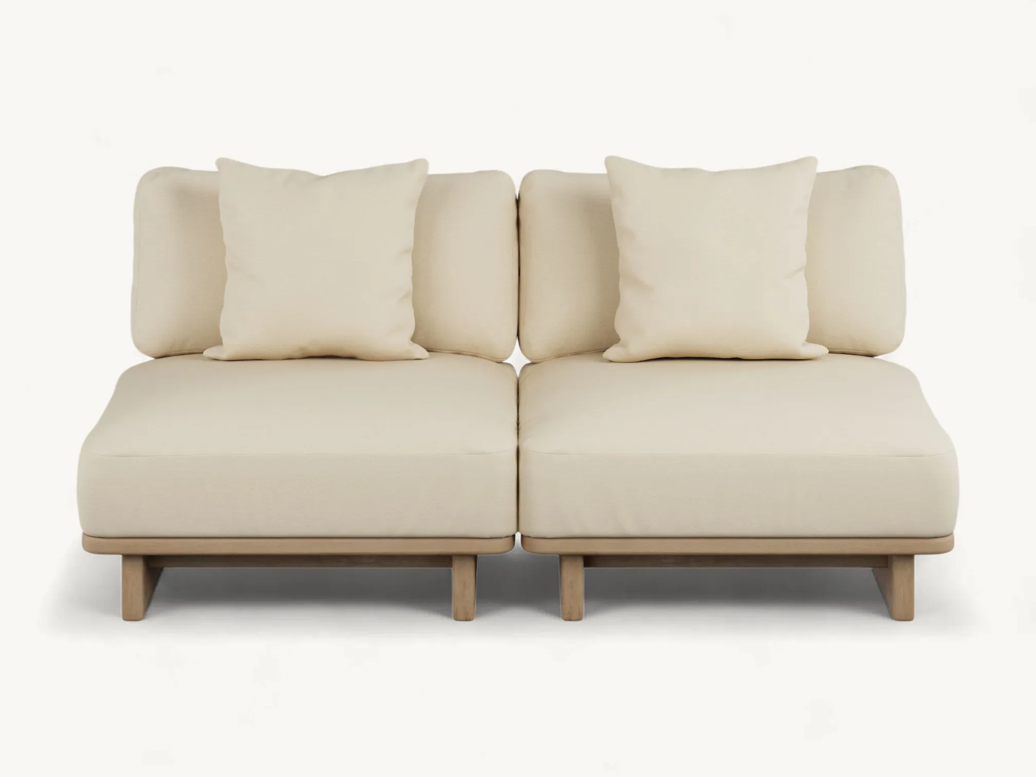 Japandi style armless outdoor sofa made of light-finished teak wood with plush cream cushions.
