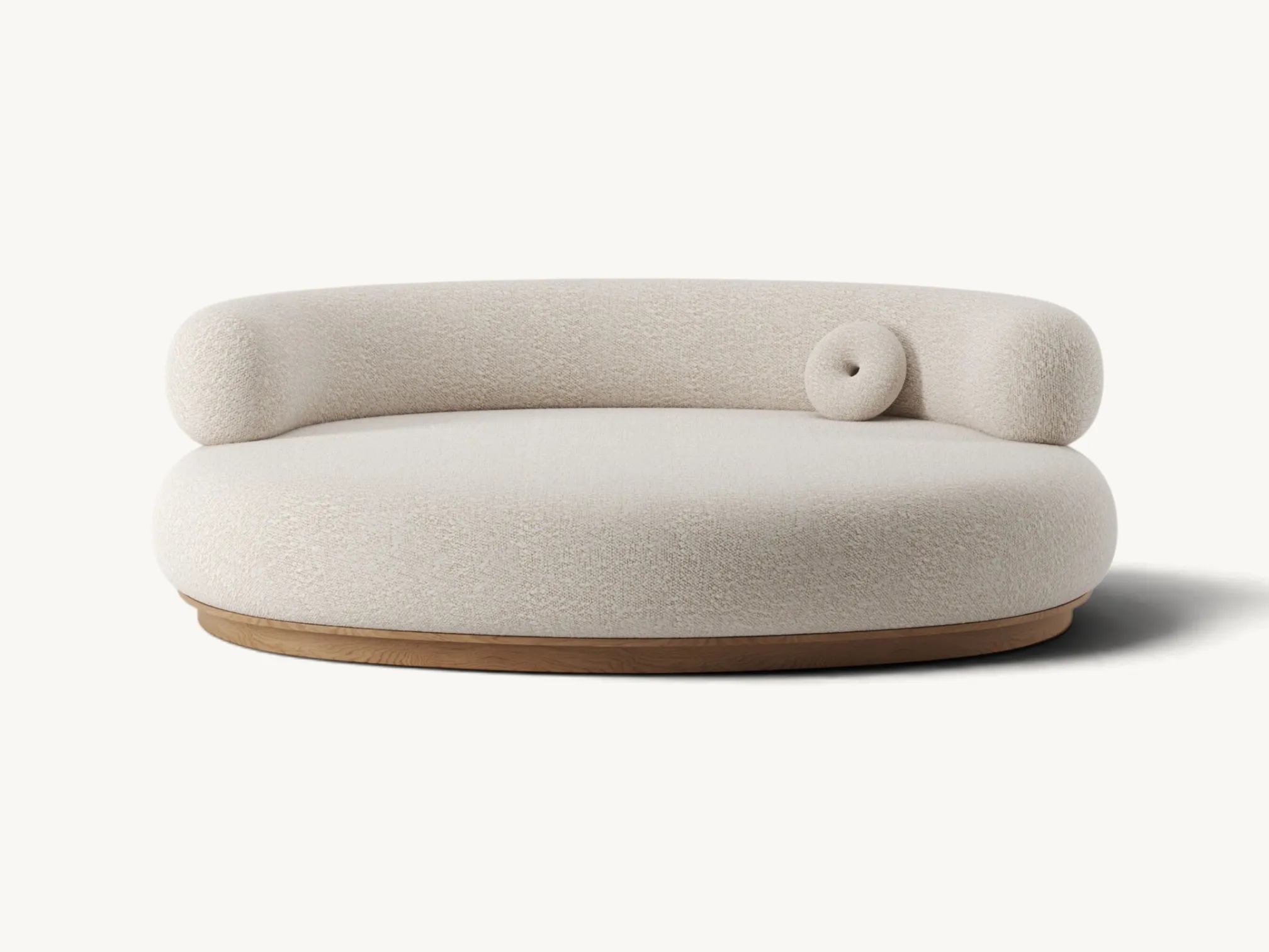 Minimalist Japandi round sofa with cream bouclé upholstery and light oak wooden finish.