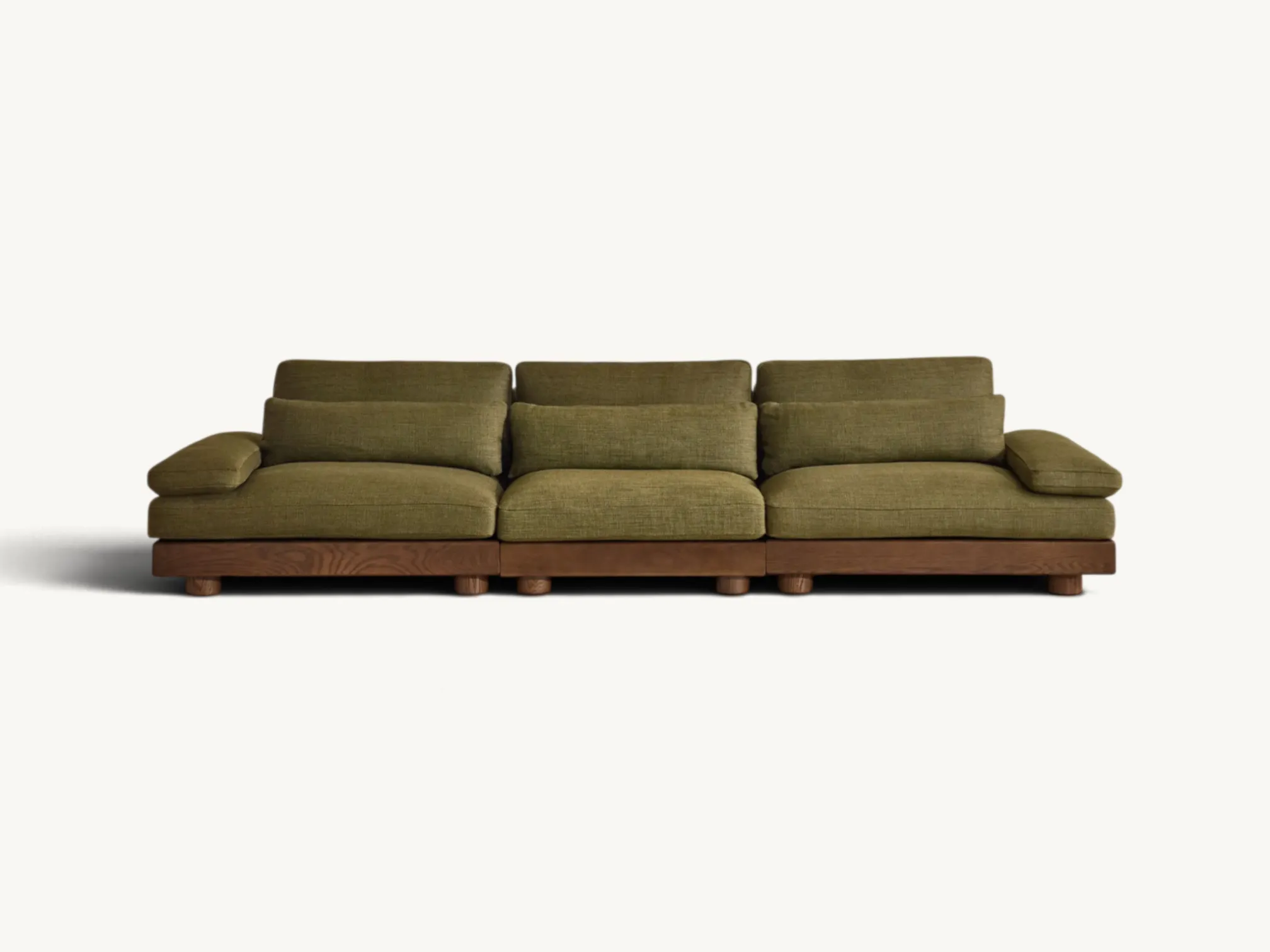 Low profile three seater sofa with solid wooden base and olive green fabric upholstery